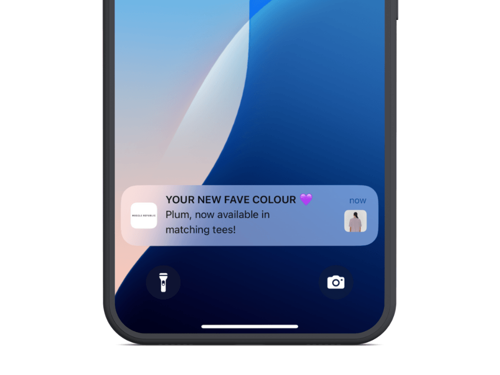 Push notification from Muscle Republic about plum-colored tees on an iPhone lock screen