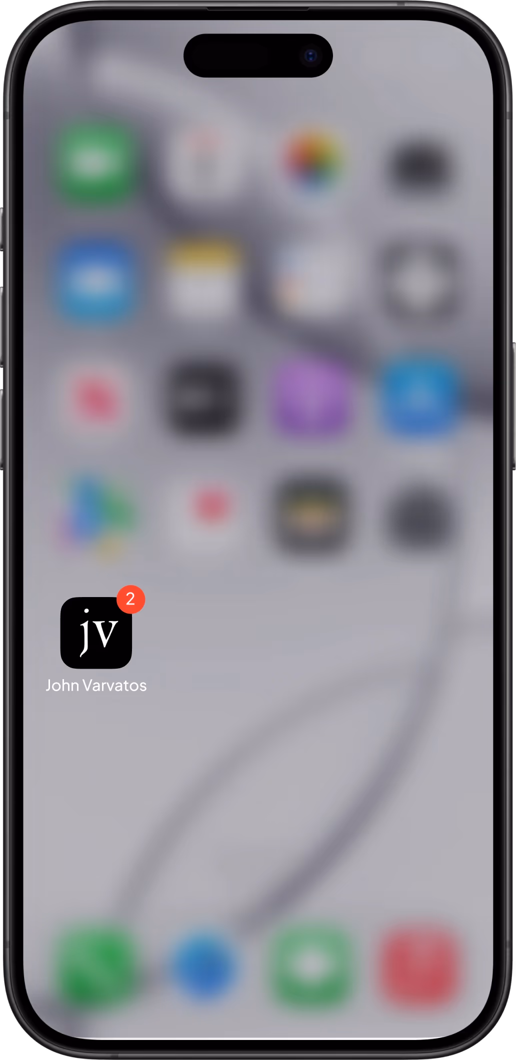 A phone home screen with every other app blurred out and the John Varvatos app icon in focus, carrying a notification badge